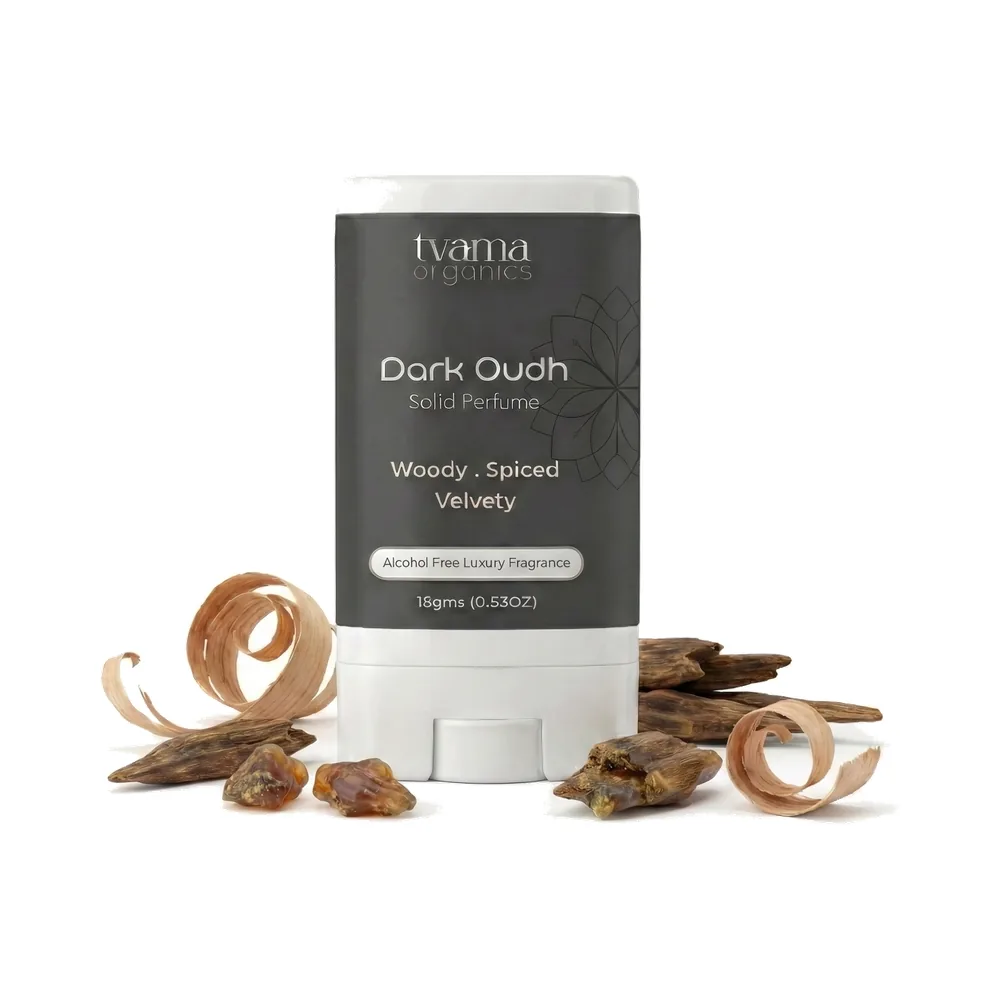 Tvama Dark Oudh Solid Perfume stick with agarwood pieces and wood shavings