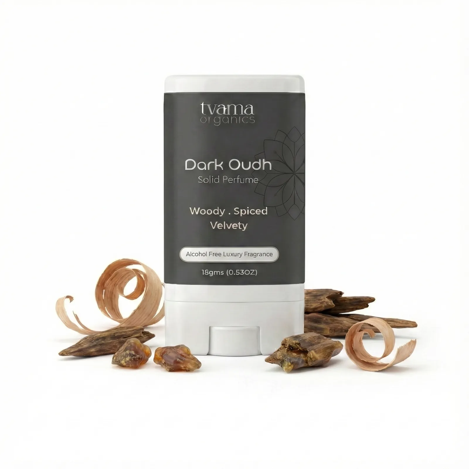 Tvama Dark Oudh Solid Perfume stick with agarwood pieces and wood shavings